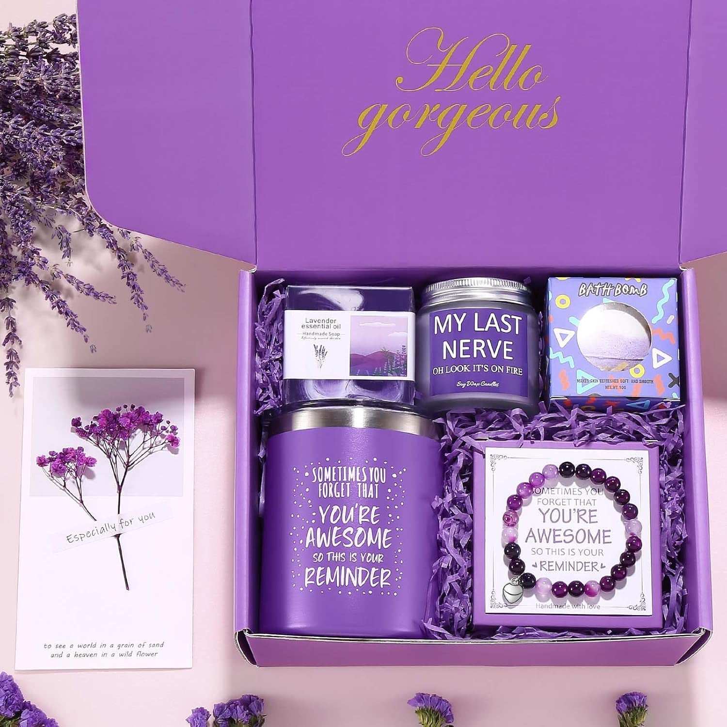 Lavender Bliss Spa Gift Set with bath essentials and tumbler in purple packaging for relaxation and self-care.