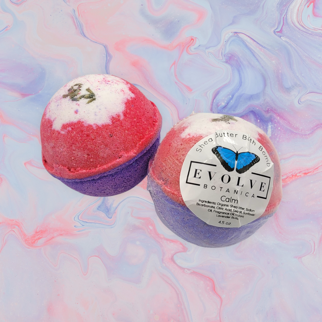 Colorful shea butter bath bombs with sunflower oil and sea salt for calming and nourishing skin.