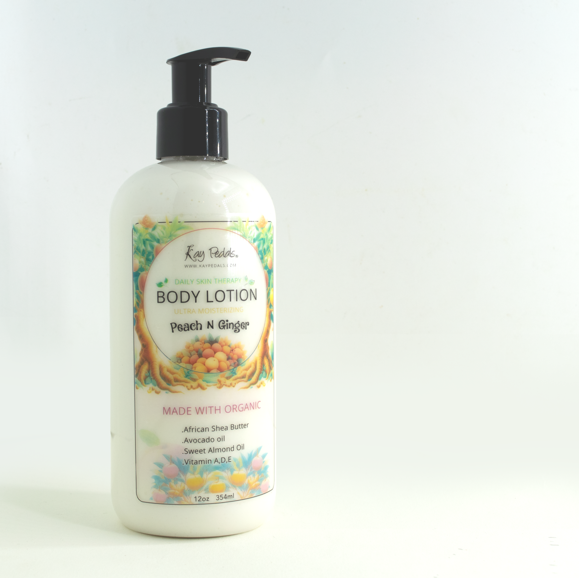 Organic Ginger Peach Glow body lotion bottle with shea butter and peach nectar blend